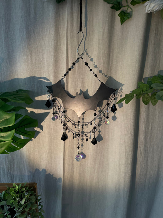 It’s friggin bats (big crystal suncatcher edition)