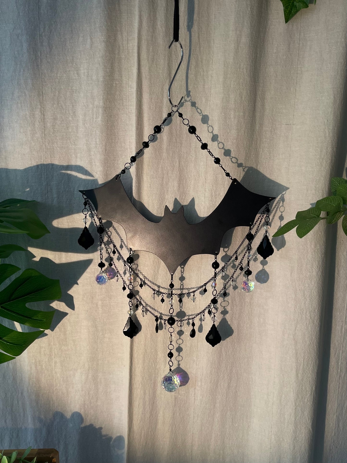 It’s friggin bats (big crystal suncatcher edition)