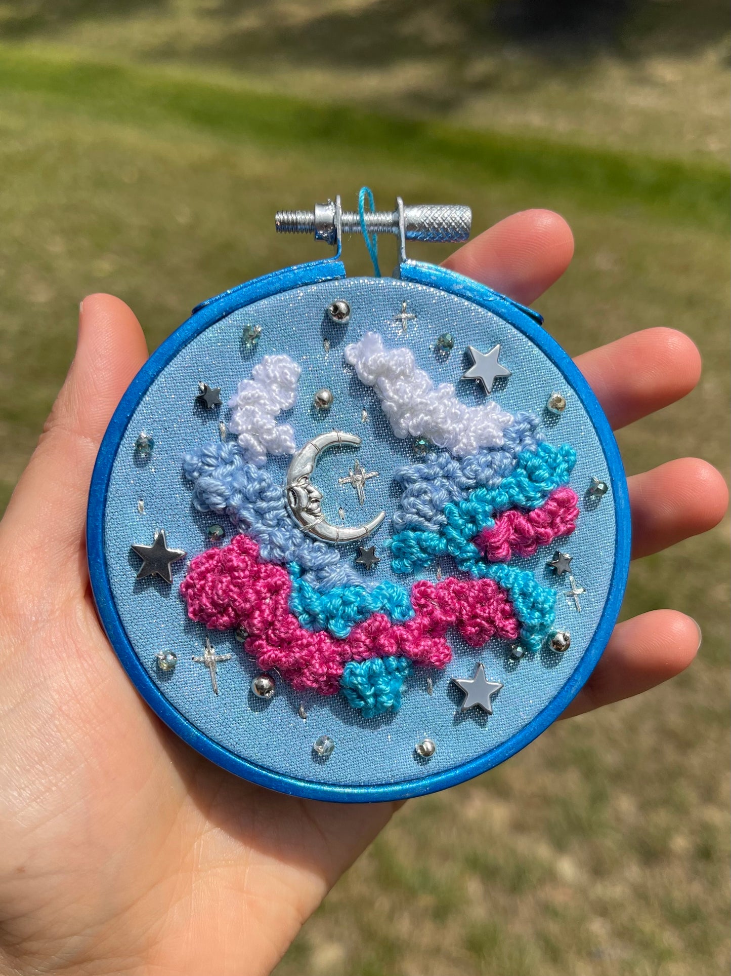 Blue iridescent moon and clouds embroidery