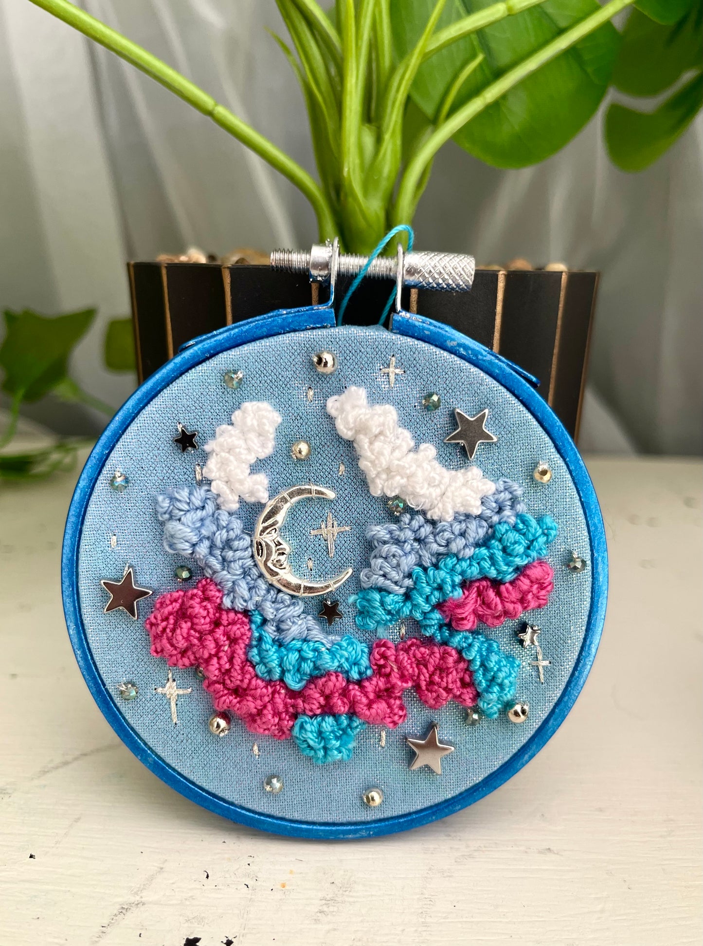 Blue iridescent moon and clouds embroidery